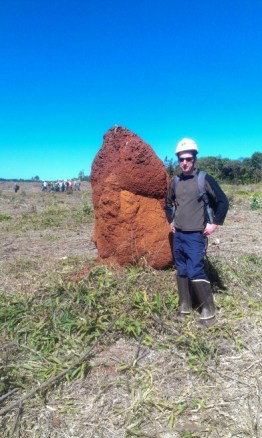John Moore modelling snake chaps. Even the anthills were large in Brazil.